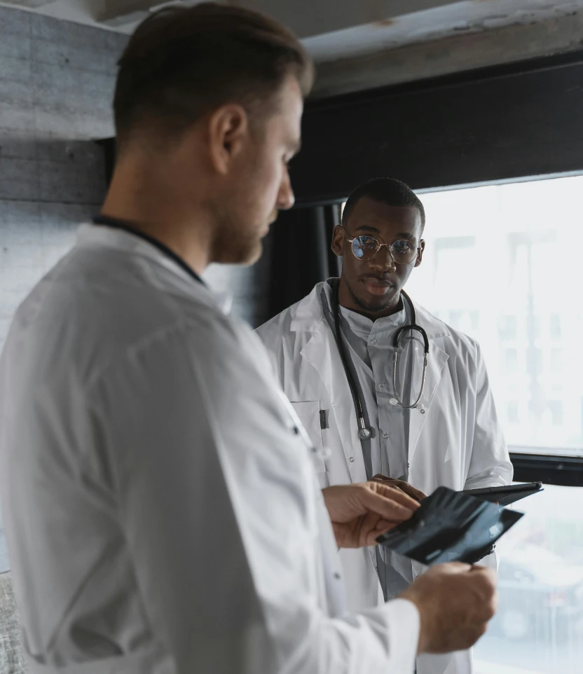 Healthcare security specialist reviewing system data on a workstation
